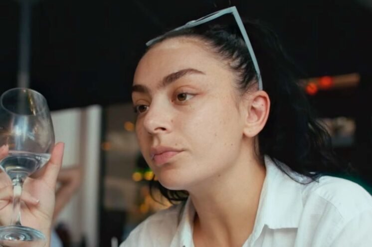 Charli XCX’s New Film Erupcja Trailer Promises a Volcanic Twist on Romance